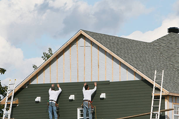 Professional Siding Installation technician working in Potomac, MD